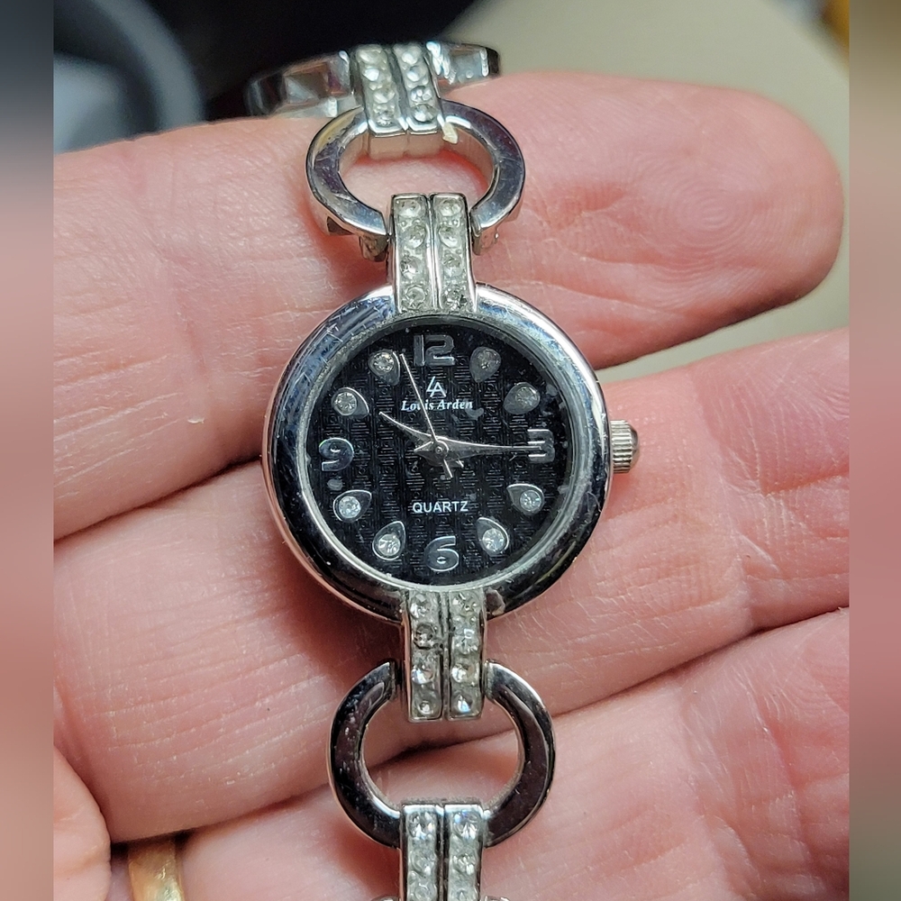 Ladies opera style dress watch, bracelet has stone accents